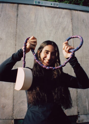 ceramics | leather | woman | smile | bag